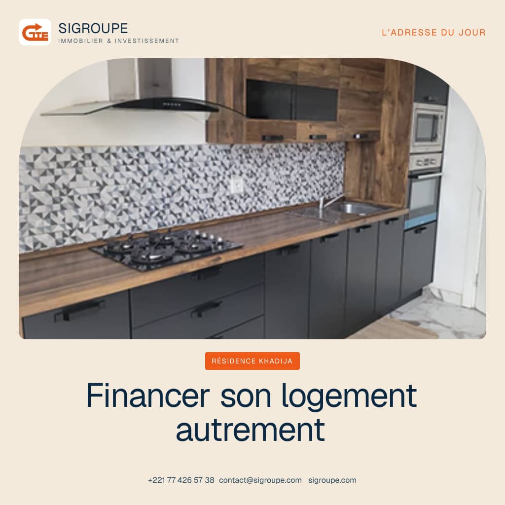 Quartier résidentiel sénégalais en développement avec immeubles récents et voirie aménagée.
